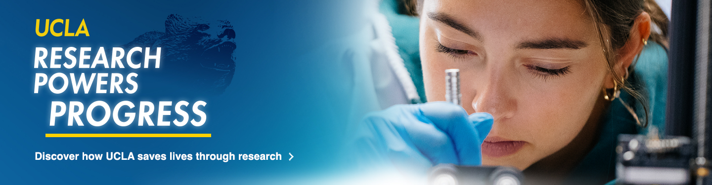 Close up of a woman's face working in a lab