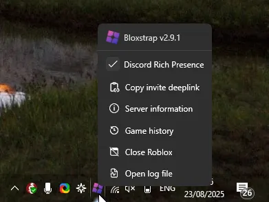 Screenshot showing an icon of the Bloxstrap logo in the system tray, mouse cursor over it, with a right-click menu of Bloxstrap options showing
