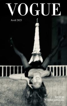 a woman is upside down in front of the eiffel tower with her legs spread out