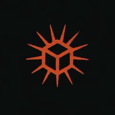 an orange and black logo on a black background