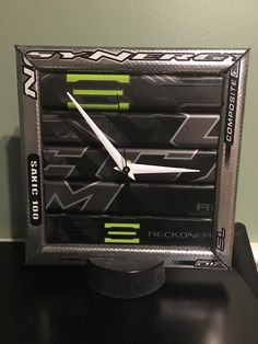 a clock made out of an ice hockey goalie's block