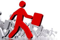 a person carrying a red object in front of a group of people with the word name of presentation on it