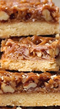 three pieces of pecan bar stacked on top of each other