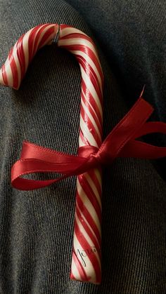 a candy cane wrapped in red and white stripes