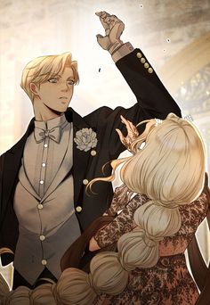 a man in a tuxedo standing next to a blonde haired woman with her hand up