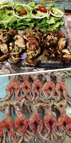 there are many different types of seafood on the table and in front of each other