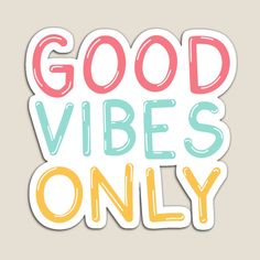 the words good vibes only are painted in pastel blue, yellow and pink