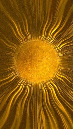 an abstract yellow and brown background with swirly lines in the center, as well as a starburst