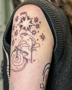 a person with a tattoo on their arm