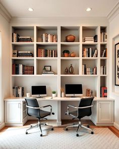 a home office with two computer desks and bookshelves
