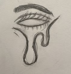 a drawing of an eye with long lashes and teary eyelashes on it's side