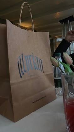 a brown paper bag sitting on top of a table