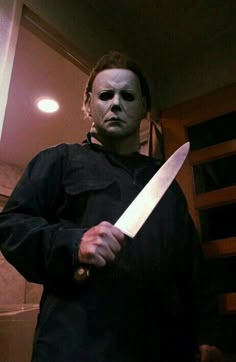 a man with a knife in his hand