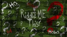 graffiti written on a brick wall with question marks in red and white paint, which says riddle me this?