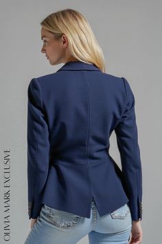 Crafted with precision and elegance, the OliviaMark blazer is a masterpiece of modern sophistication. Its deep navy hue exudes a sense of timeless allure, while the tailored fit flatters every curve with grace. The single button closure adds a touch of understated luxury, ensuring that you make a statement without overwhelming. Paired seamlessly with denim or a crisp white blouse, this blazer is the epitome of versatile elegance, perfect for any occasion where you desire to look and feel your absolute best. Elegant Structured Business Casual Outerwear, Structured Blazer With Notch Lapel For Business, Chic Structured Blazer For Work, Chic Blue Suit With Lapel Collar, Structured Blazer With Suit Collar For Business Casual, Structured Blazer With Notch Lapel For Office, Structured Notch Lapel Blazer For Business Casual, Structured Notch Lapel Blazer For Office, Chic Fitted Long Sleeve Suits