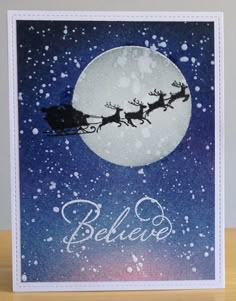 a christmas card with santa's sleigh flying through the sky