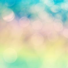 an abstract blurry background with blue, yellow and green colors royalty photo - illustration