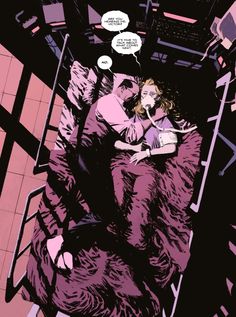 an image of a man kissing a woman on the cheek