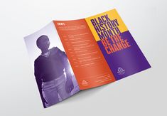 an orange and purple brochure is open to show the front page, which features a man in black