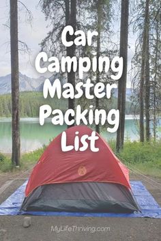 a tent with the words car camping master packing list on it and trees in the background