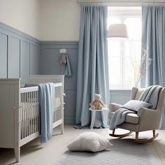 a baby's room with a rocking chair and crib