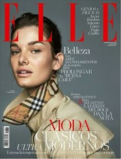 a woman in a trench coat is featured on the cover of an italian magazine called elle