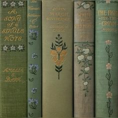 four books are lined up next to each other with flowers on the front and back covers