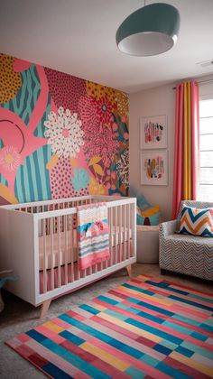 a baby's room decorated with colorful wallpaper and striped rugs in front of the crib