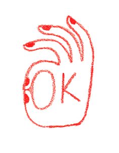 the word ok written in red crayons on a white background