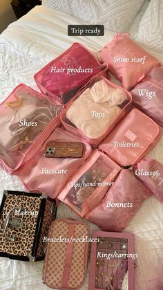 the contents of a travel bag laid out on a bed with labels labeled in english
