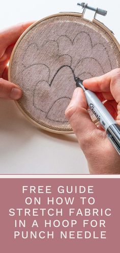 two hands are working on a cross stitch project with the text, free guide on how to stretch fabric in a hoop for punch needle