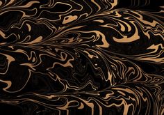 an abstract black and gold background with swirls