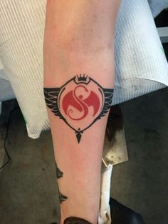 a person with a tattoo on their arm