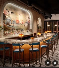 an image of a bar with many stools