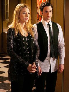 a man and woman standing next to each other