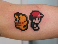 an arm with two pixel tattoos on it, one has a character from the video game super mario