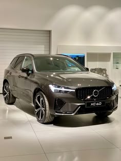 a volvo car is on display in a showroom