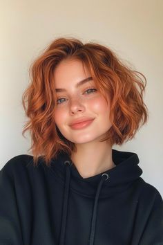 Click for More ➡️ | Save for Later ❤️A shorter, chin-length bob with subtle auburn undertones brings out depth in wavy textures. Ideal for creating a bold yet natural look. (Short Wavy Bob with Auburn Undertones - Wavy Bob Hairstyles) 