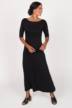 Organic Essentials Elbow Sleeve Boatneck Dress | Indigenous Boat Neckline Dress Casual, Boat Neck Dress Outfit, Black Boat Neck Midi Dress, Boatneck Maxi Dress, Chic Black Boat Neck Dress, Chic Black Boat Neck Midi Dress, Boatneck Dress Jewelry, Bateau Dress Casual, Black Boatneck Dress