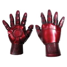 an iron man glove is shown with the hands extended and one hand raised up to show it's inner workings