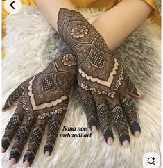 henna tattoo on the hands of a woman