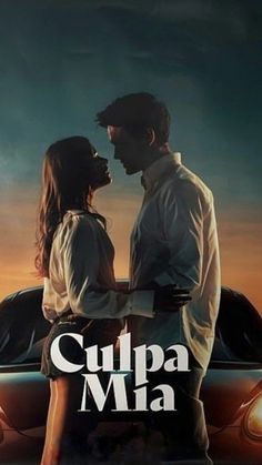 a man and woman standing next to each other in front of a car with the words cupa mia on it