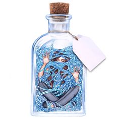 a bottle with a drawing on it and a tag hanging from the top of it