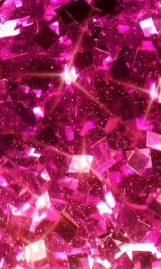 pink crystals are shown in this close up photo