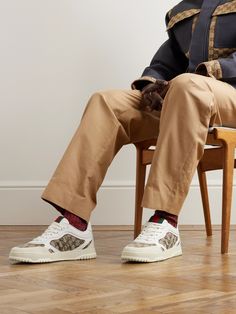 Creative Director Sabato De Sarno incorporates archival details into his first sneaker design for Gucci: the 'Re-Web' low-tops. Detailed with the iconic striped webbing on the tongues, they're made from logo-jacquard 'GG' canvas and have leather and suede overlays. Perforations along the toe boxes and sides provide breathability. Gucci Sneakers With Contrast Sole For Streetwear, Gucci Leather Sneakers For Streetwear, Gucci Suede Sneakers, Gucci Sneakers Outfit Men, Gucci Screener Leather Sneakers, Gucci Lace-up Sneakers With Leather Sole, Gucci Screener Sneakers, Gucci Lace-up Sneakers For Streetwear, Gucci Leather Sneakers