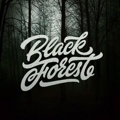 the words black forest written in white on a dark background