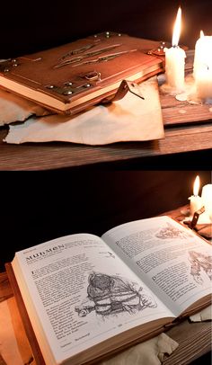 an open book sitting on top of a wooden table next to candles and bookshelves