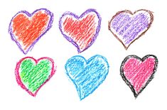 four hearts drawn with colored crayon pencils on white paper stock photo - 1307892