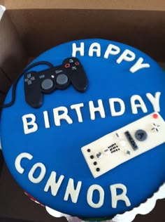 a birthday cake with a video game controller on it
