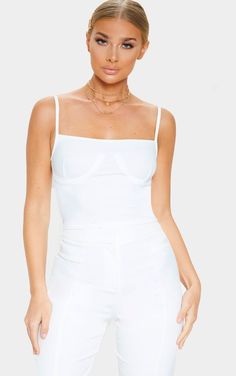 Cream Bustier Detail Rib Crop Top White Sleeveless Crop Top With Boned Bodice, White Stretch Scoop Neck Crop Top, White Boned Bodice Crop Top, Cheap Seamless Bustier Crop Top, Affordable Seamless Bustier Crop Top, Plt White Crop Top, Ivory Bustier Top, Basic White Ribbed Crop Top, Luxury Cream Cropped Top